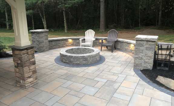 newly installed fire pit and stone patio