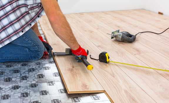 installing new laminated wooden floors